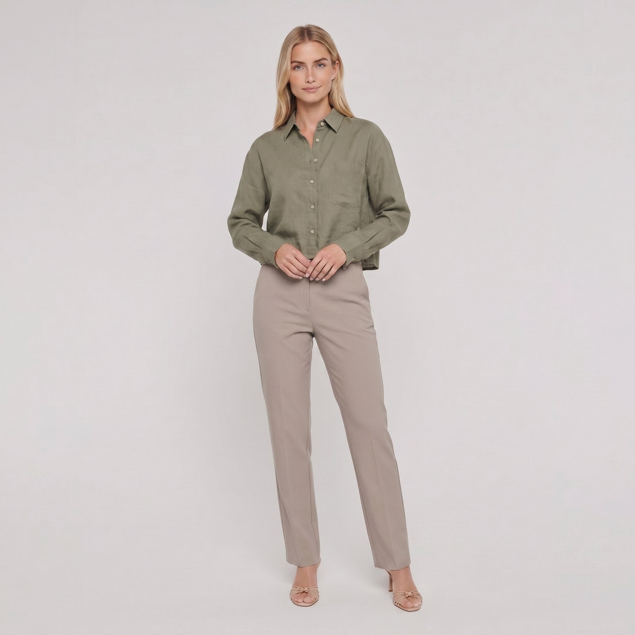 Model wearing forest green linen shirt front view - Cleo Women's Shirt