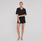 Cora Crochet Cover-Up Set in black — open-knit button-up shirt and shorts