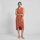 Terracotta orange sleeveless V-neck draped twist-front midi dress with side slit