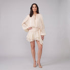 Cream ivory pleated chiffon mini dress with balloon sleeves and ruffled hem, front view