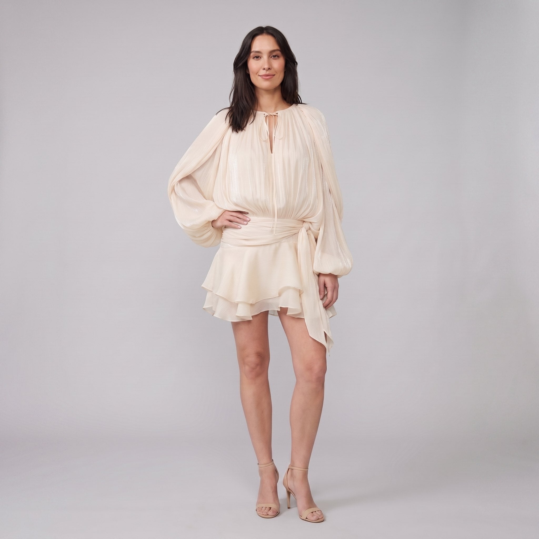 Cream ivory pleated chiffon mini dress with balloon sleeves and ruffled hem, front view