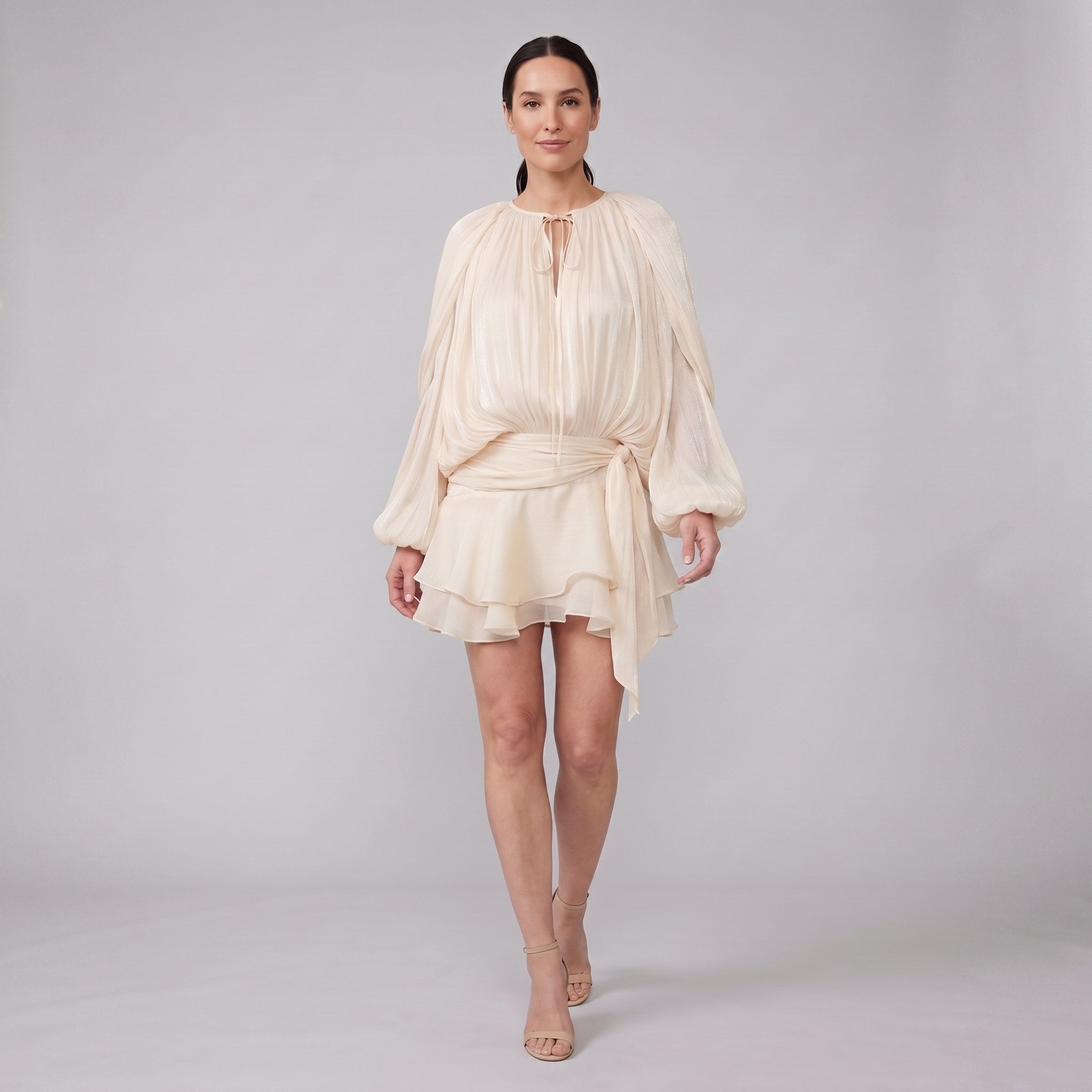 Cream ivory pleated chiffon mini dress, walking pose