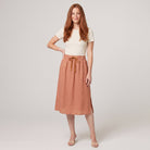 Peach linen A-line knee-length drawstring skirt, front view on model