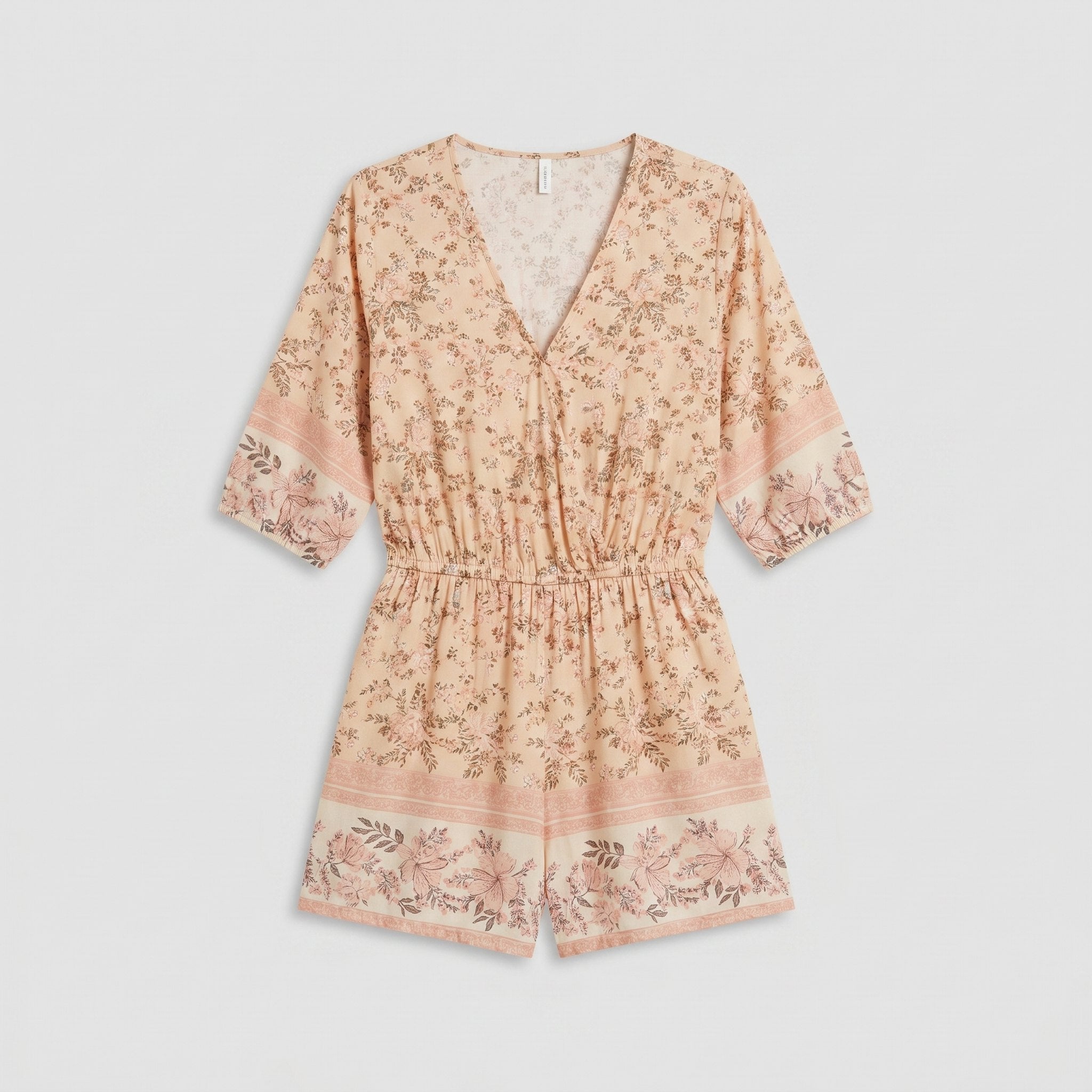 Beige floral playsuit product flat-lay - Pamela Boutique