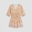 Beige floral playsuit product flat-lay - Pamela Boutique