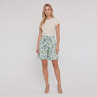 Pamela Boutique mint floral pleated shorts, model view