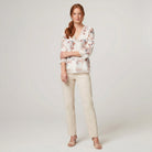 Pamela Boutique floral V-neck blouse, model side pose