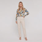 Pamela Boutique stone geometric print crew-neck blouse, model front view