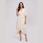 Ivory white Gina wrap midi dress with V-neck and flutter sleeves on model
