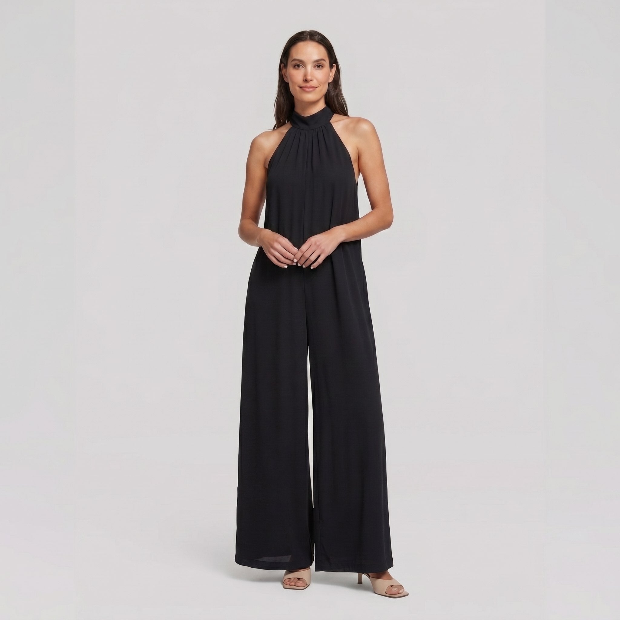 Black halter neck wide leg jumpsuit on model, front pose - Pamela Boutique