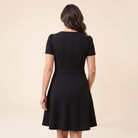 Ivy Midi Dress with centre-back zip, model back view — back