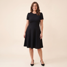 Ivy Midi Dress in black textured crepe, model front view — front