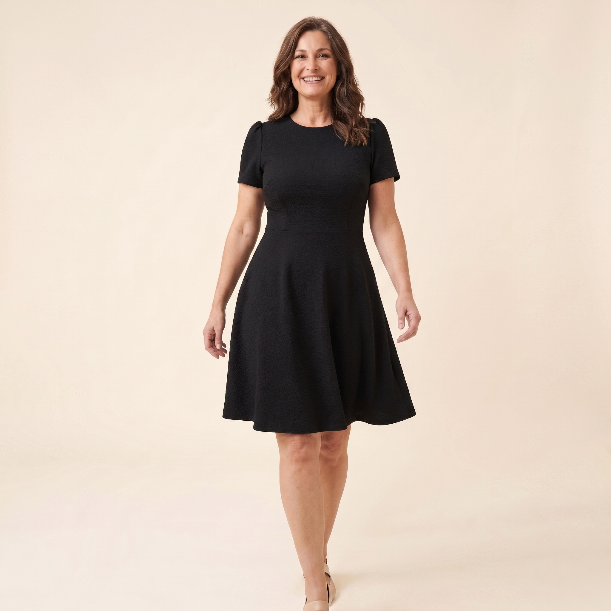 Ivy Midi Dress in black textured crepe, model walking shot — walk