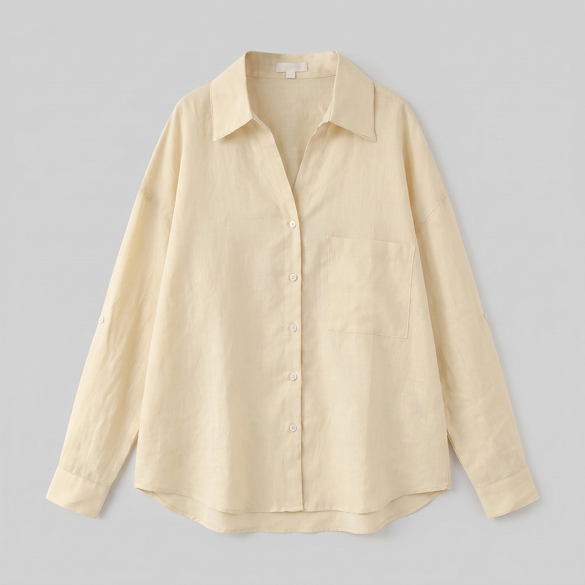 Lino Classic Shirt product flat-lay - pale yellow oversized linen shirt detail