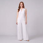 White sleeveless wide-leg linen jumpsuit, front view on model