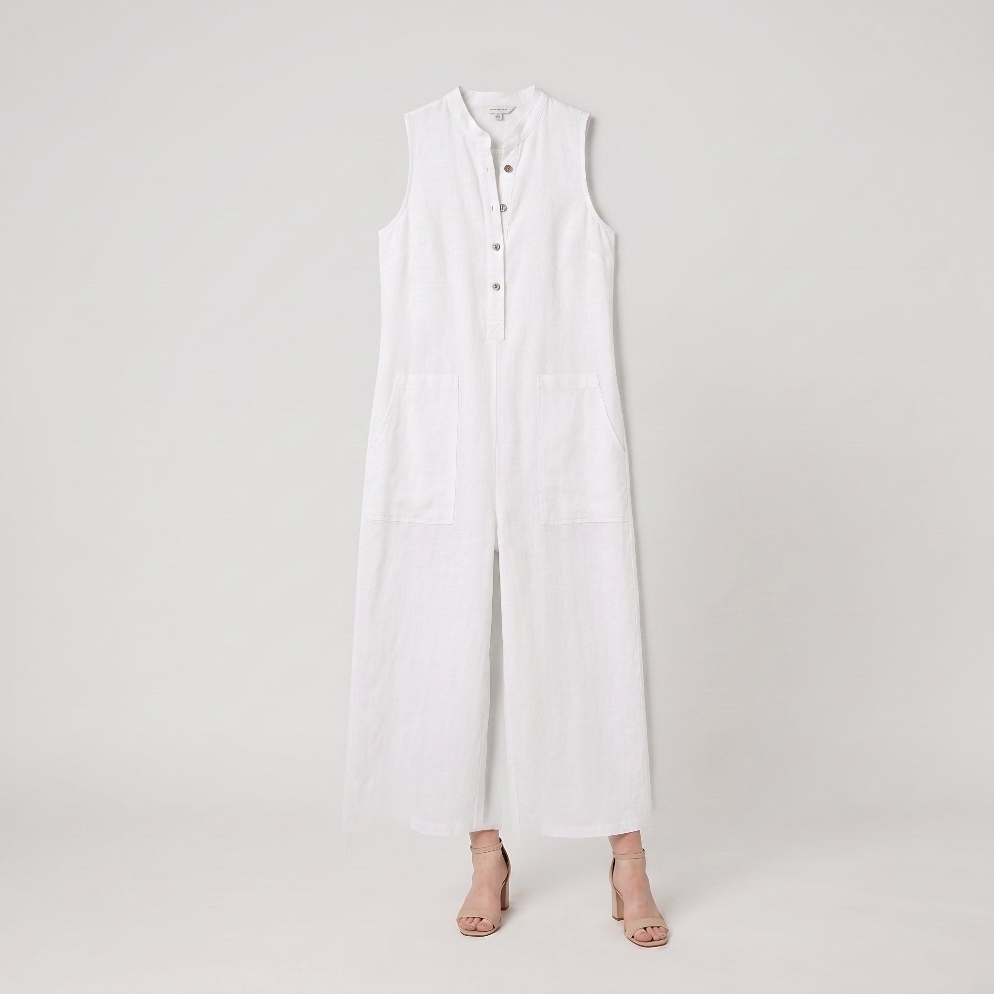 Mila white jumpsuit product flat-lay, sleeveless linen blend with button front