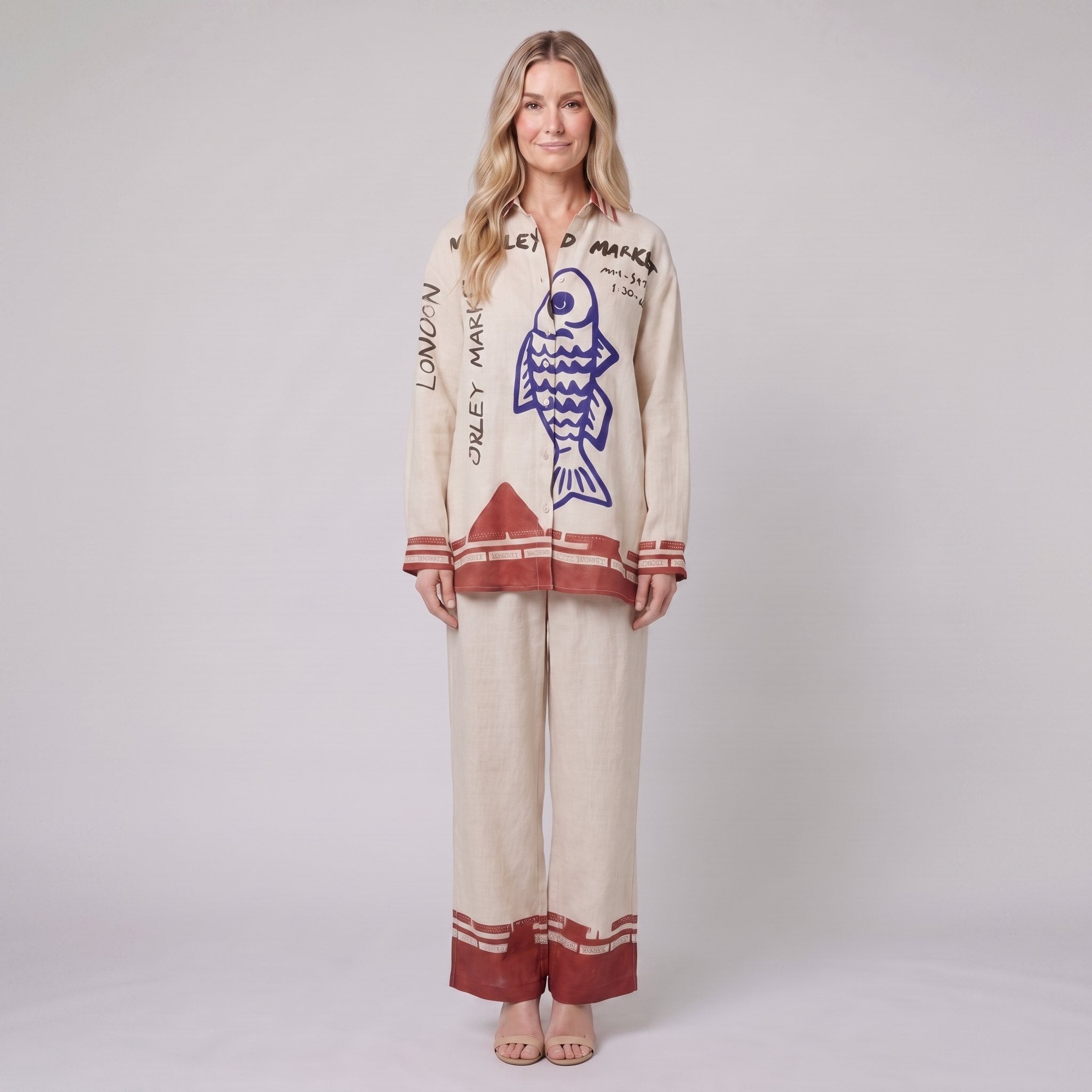 Rounelle cream linen two-piece set with blue fish print, front view