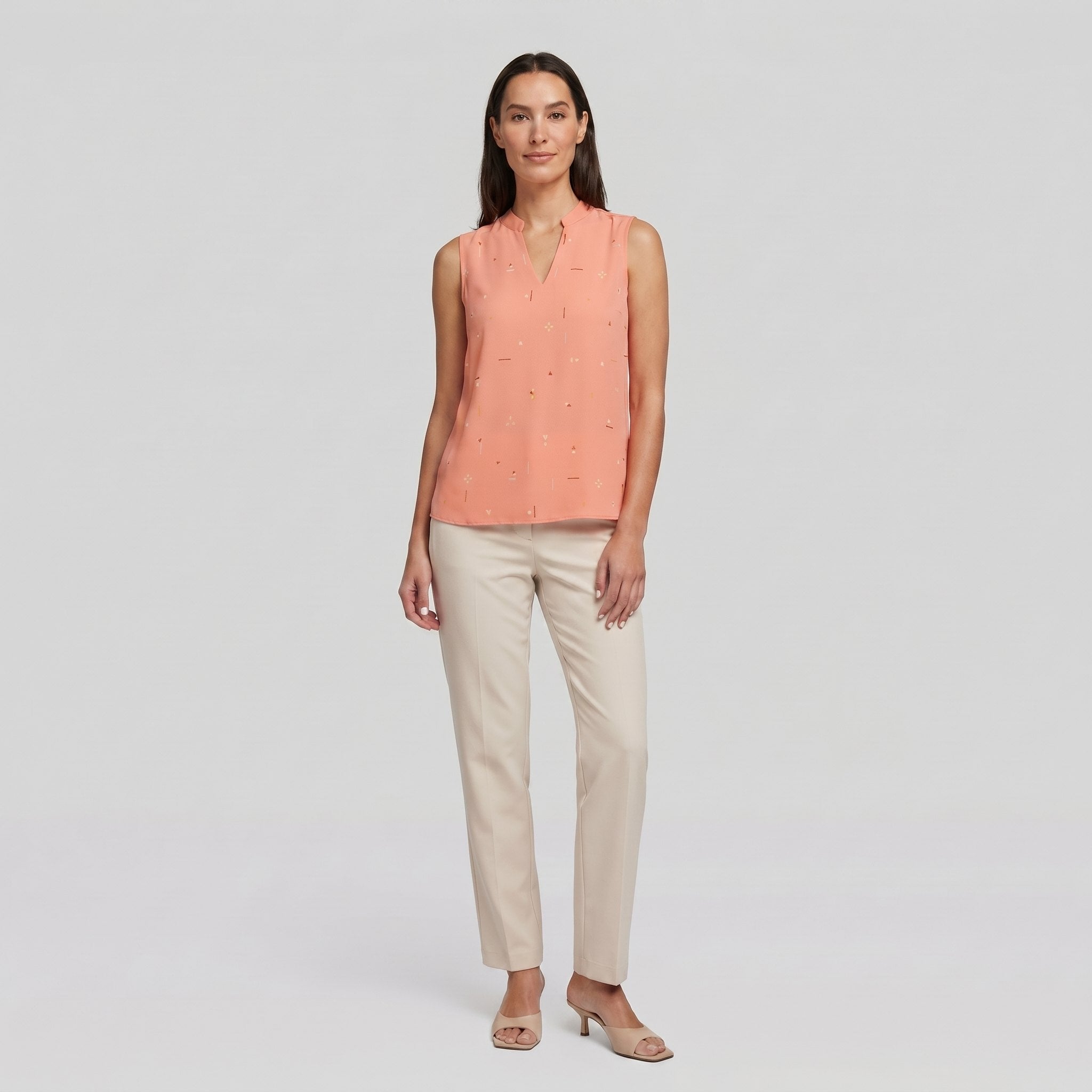 Pamela Boutique peach sleeveless V-neck blouse, model view