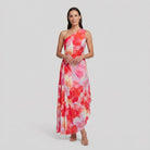 Model wearing floral pleated midi dress front view - Taya Midi Dress