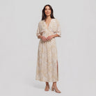 Beige tropical-print maxi dress, front view on model