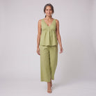 Vera sage green lace-trimmed loungewear set walking
