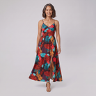 Vera maxi dress in floral print — model walking towards the camera, natural movement