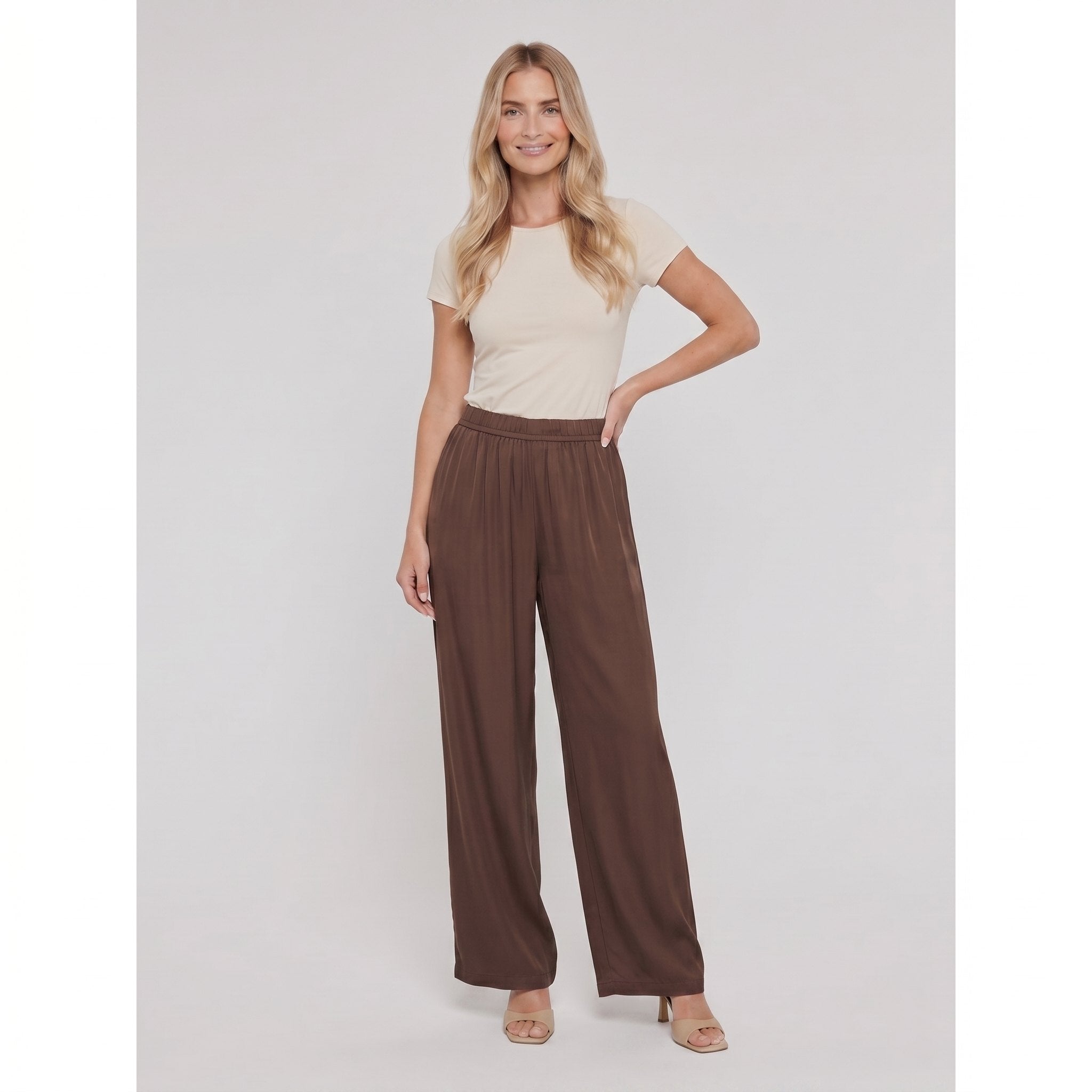Pamela Boutique brown high-waist wide-leg trousers, model front view