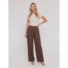 Pamela Boutique brown high-waist wide-leg trousers, model front view