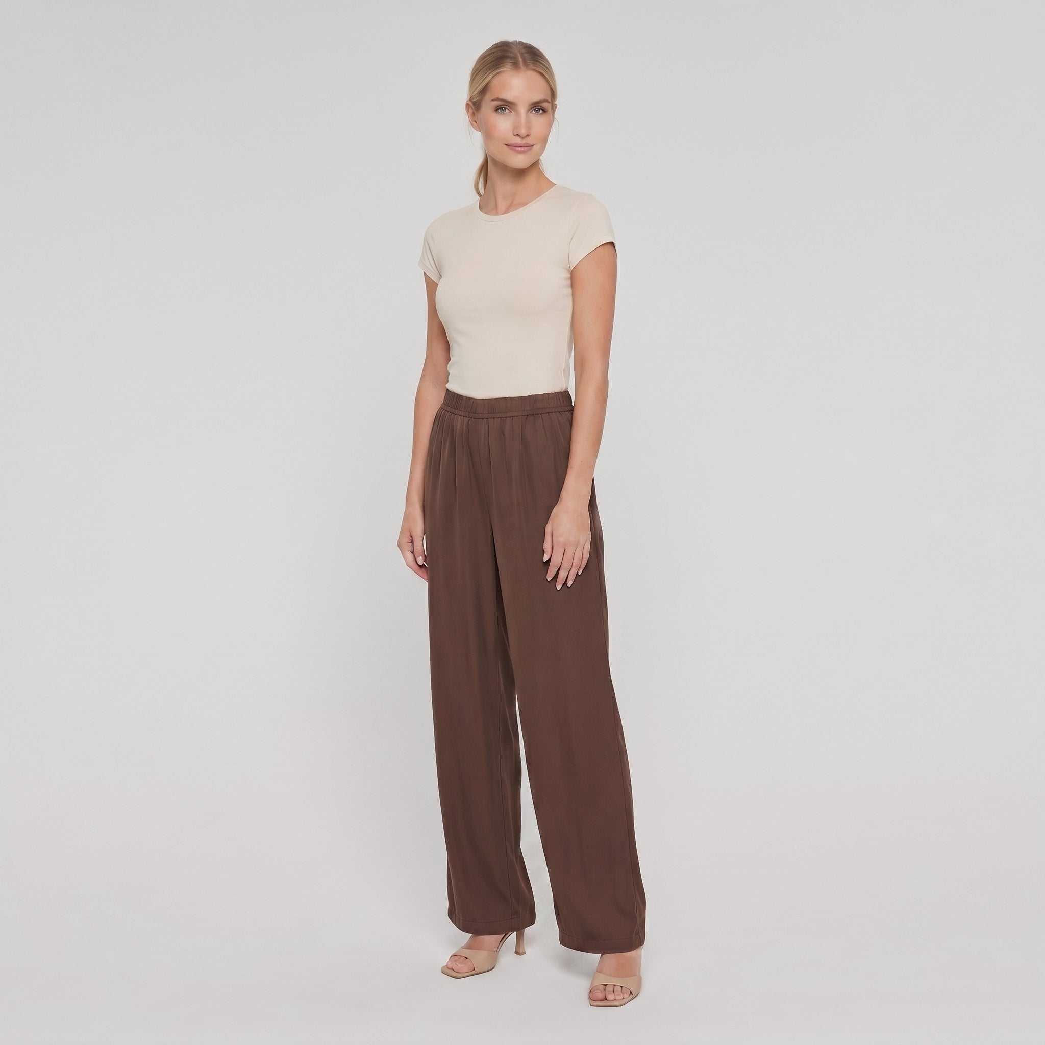Pamela Boutique brown wide-leg trousers, model angle pose