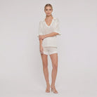 Wina Women's Set in white — lightweight hollow-knit V-neck top and shorts two-piece set