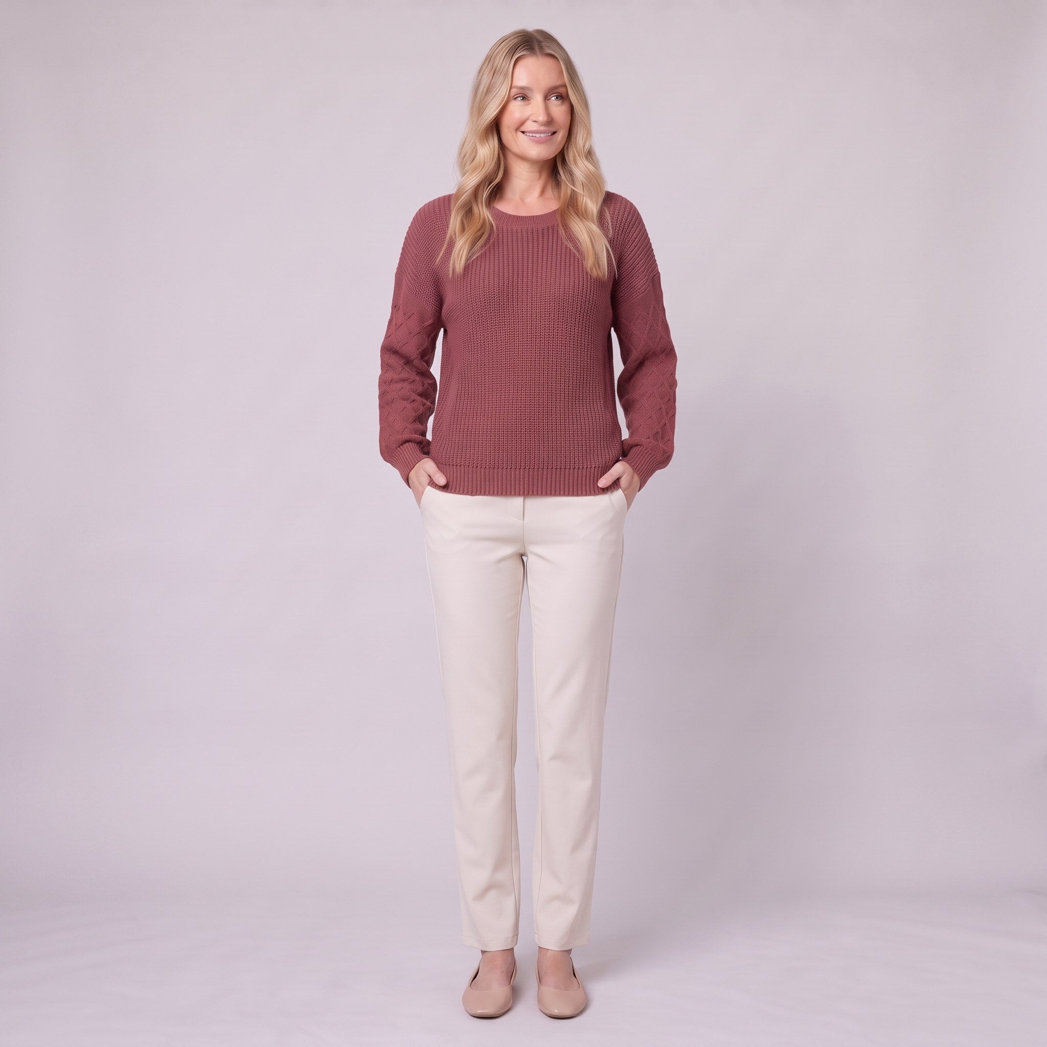 Amalie ribbed pullover in red, full-length view with hands in pockets