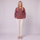 Amalie ribbed pullover in red, full-length view with hands in pockets