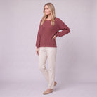 Amalie ribbed pullover in red, three-quarter view showing diamond sleeve detail