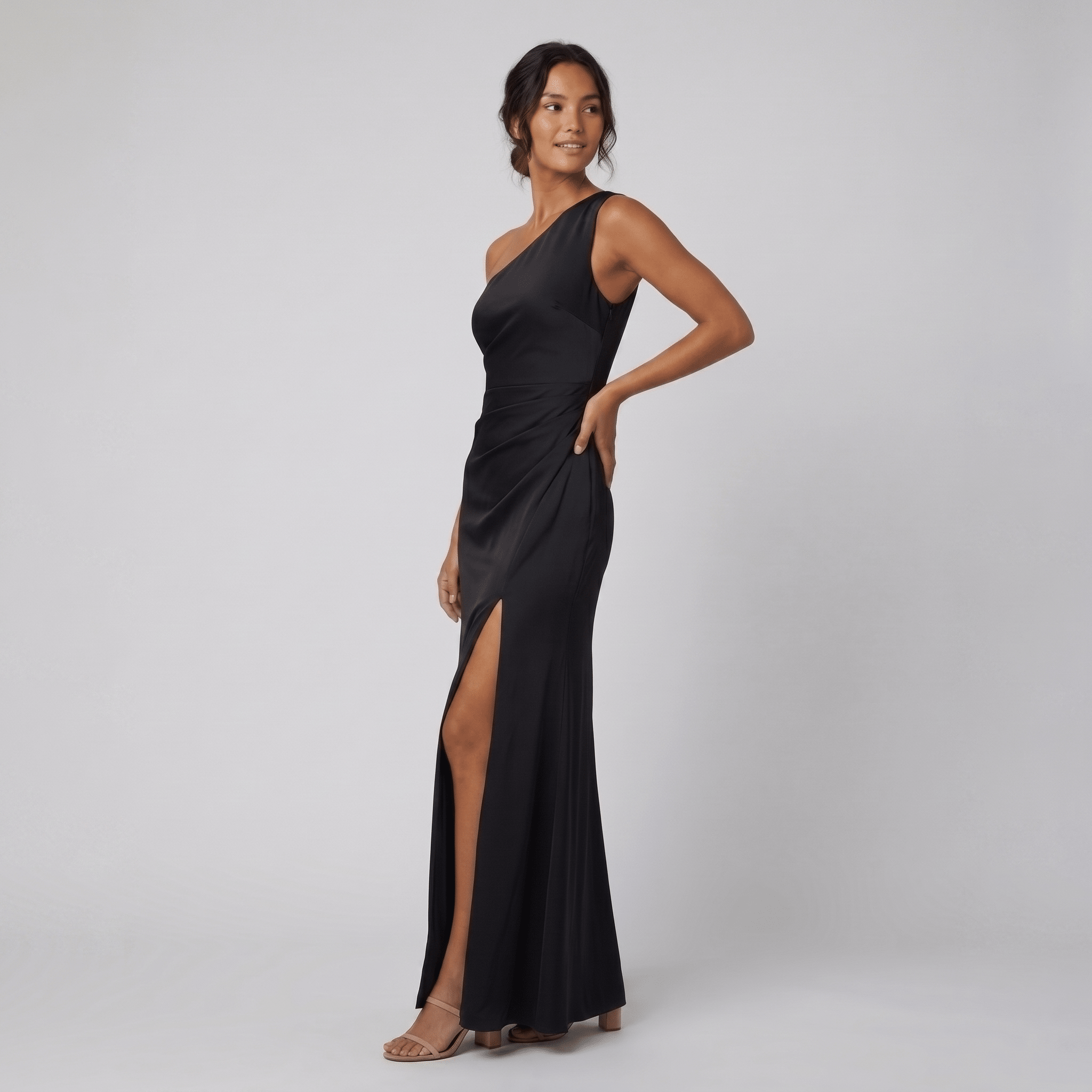Black one-shoulder evening gown with a side slit, view 1