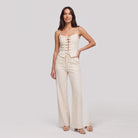 White lace-up structured top and wide-leg trouser co-ord, front view