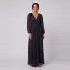 Brym black glitter knit gown with empire waist and sheer lantern sleeves, front view