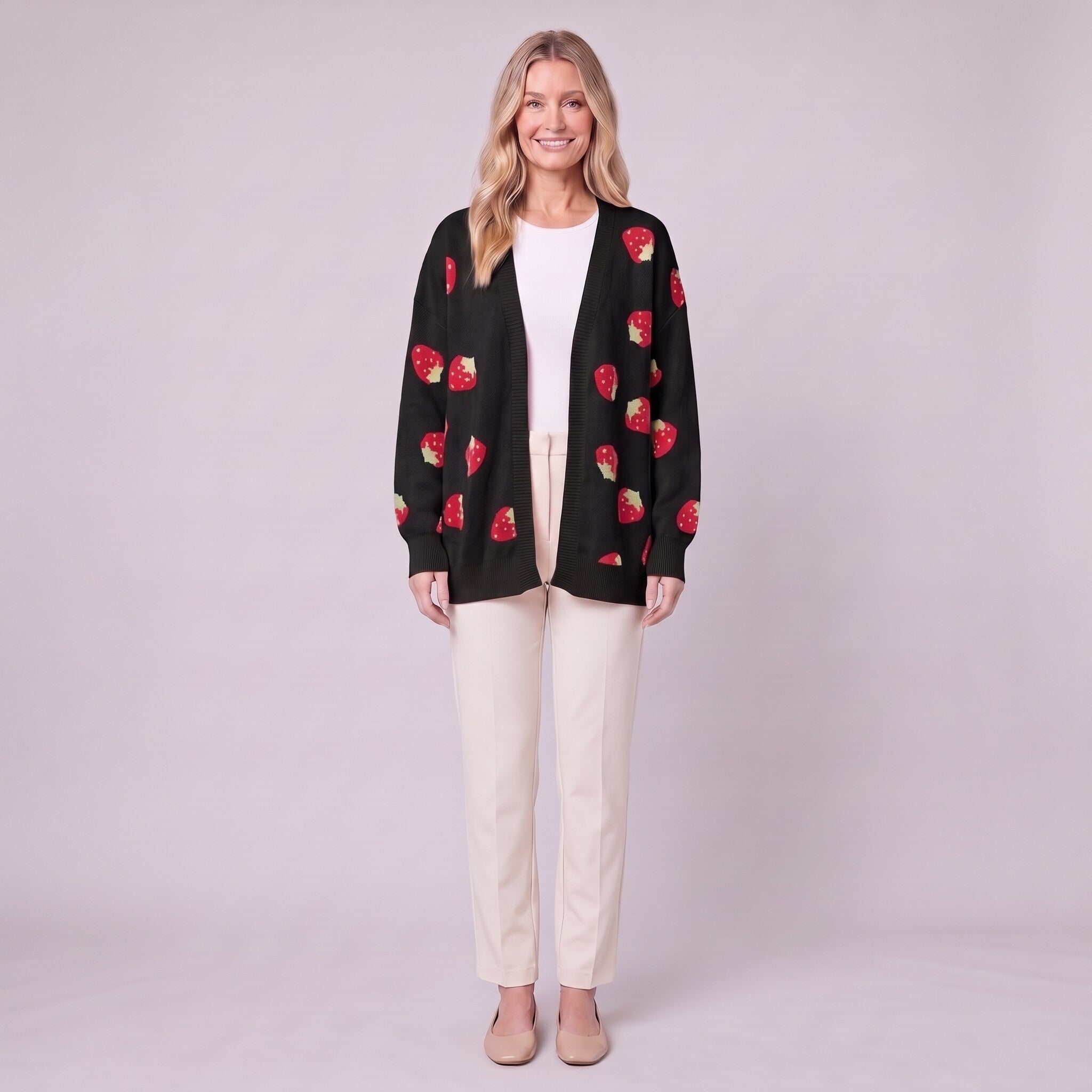 Cerise strawberry open front cardigan in black, front view on model