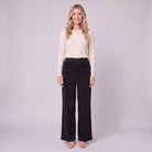 Cielle corduroy trousers in black, front view on model