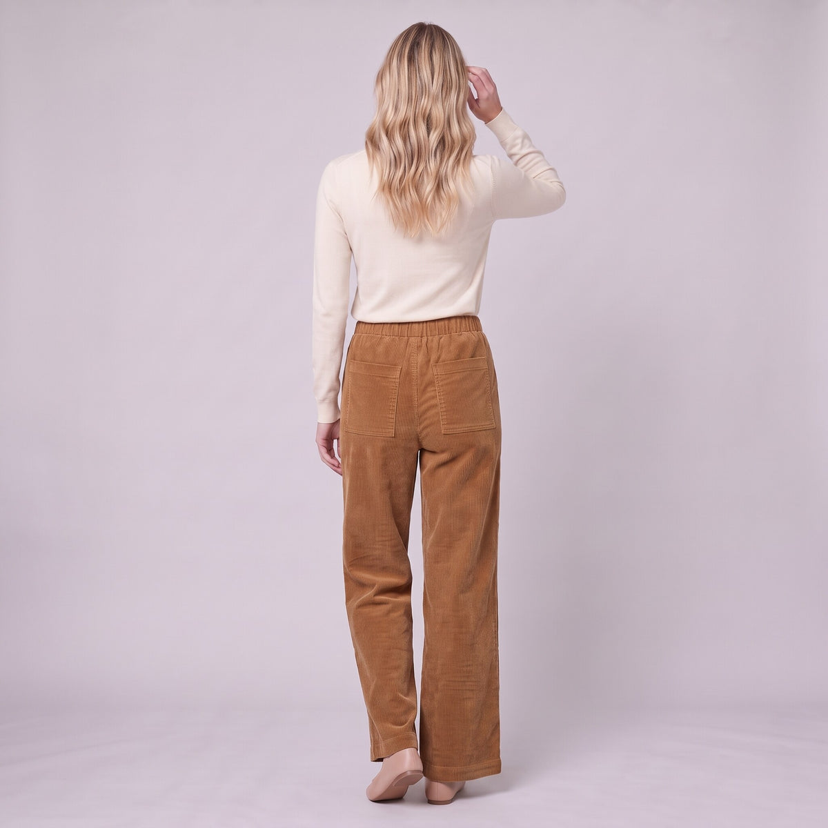 Cielle corduroy trousers in tobacco brown, back view on model