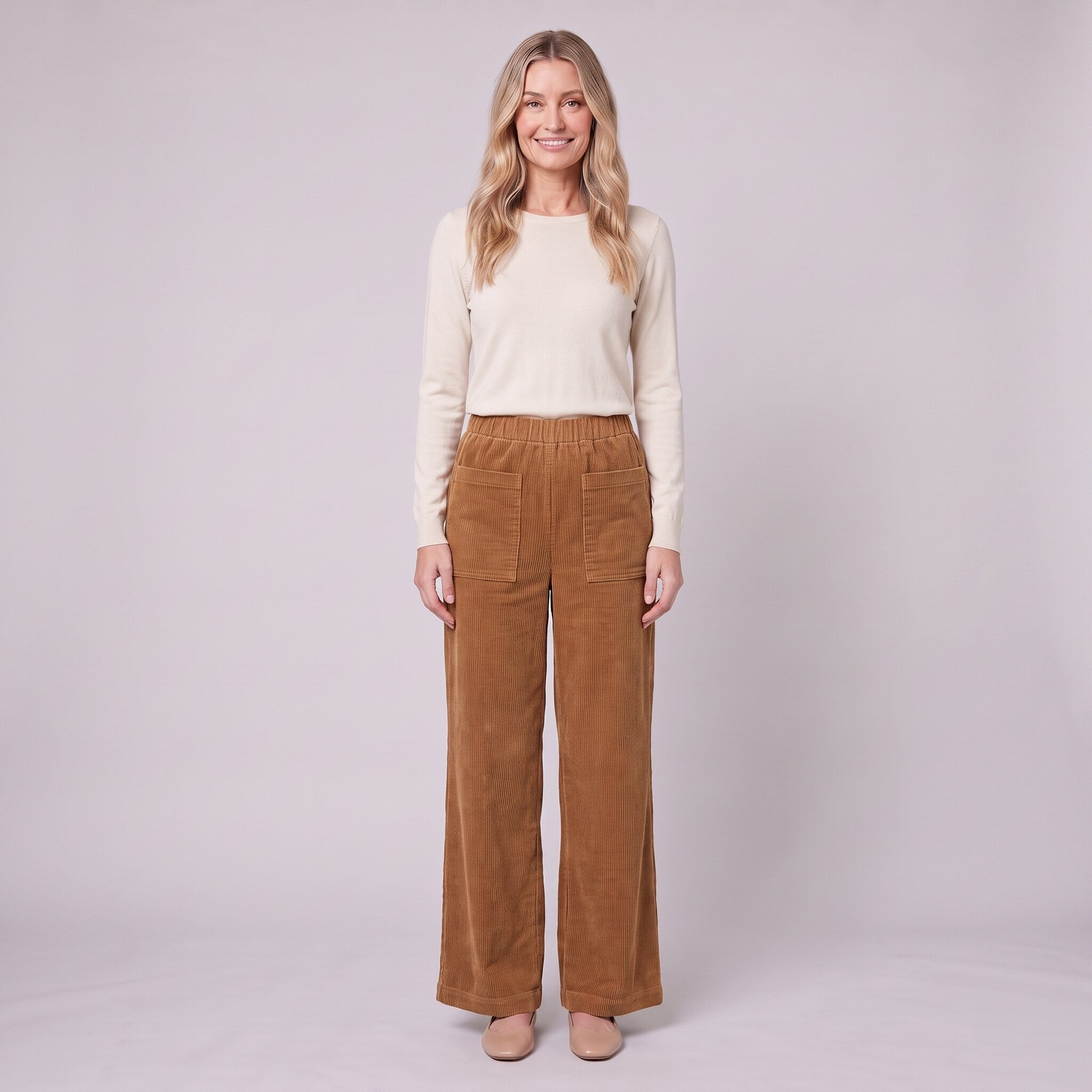 Cielle corduroy trousers in tobacco brown with patch pockets, front view on model