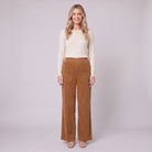 Cielle corduroy trousers in tobacco brown with patch pockets, front view on model