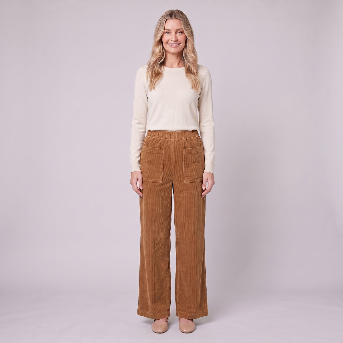 Cielle corduroy trousers in tobacco brown with patch pockets, front view on model