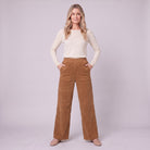Cielle corduroy trousers in tobacco brown, full-length view with hands in the patch pockets