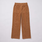 Cielle corduroy trousers flat lay, full garment in tobacco brown on light grey
