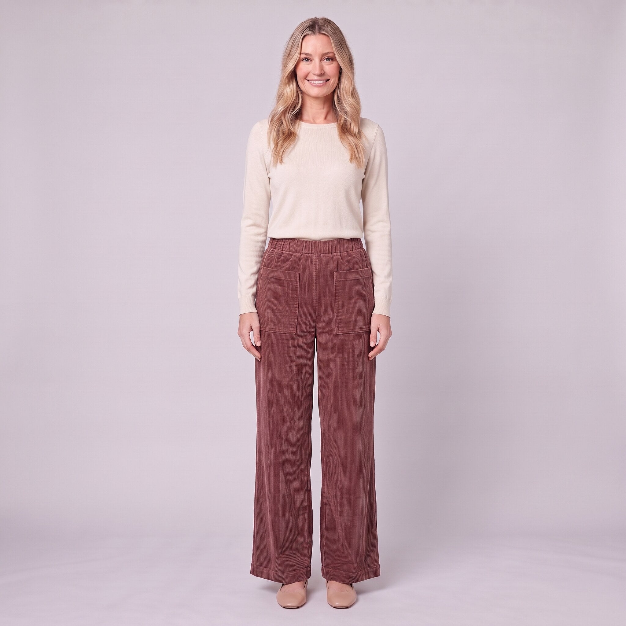 Cielle corduroy trousers in burgundy wine red, front view on model