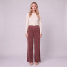 Cielle corduroy trousers in burgundy wine red, front view on model