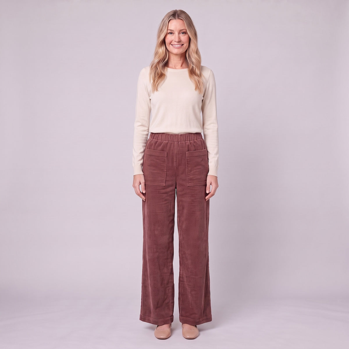 Cielle corduroy trousers in burgundy wine red, front view on model