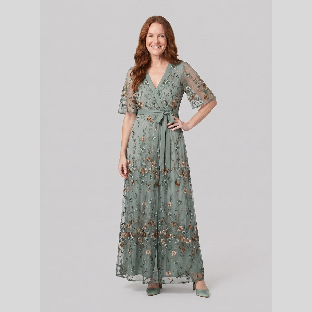 Green evening gown with sheer floral embroidery and a V-neck, view 1