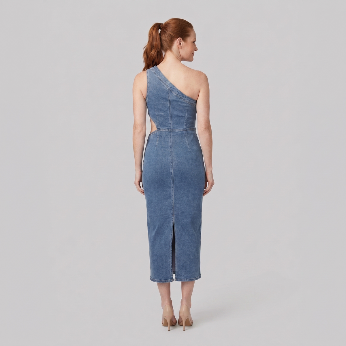 Steel blue denim midi dress with an asymmetrical cut-out, back view