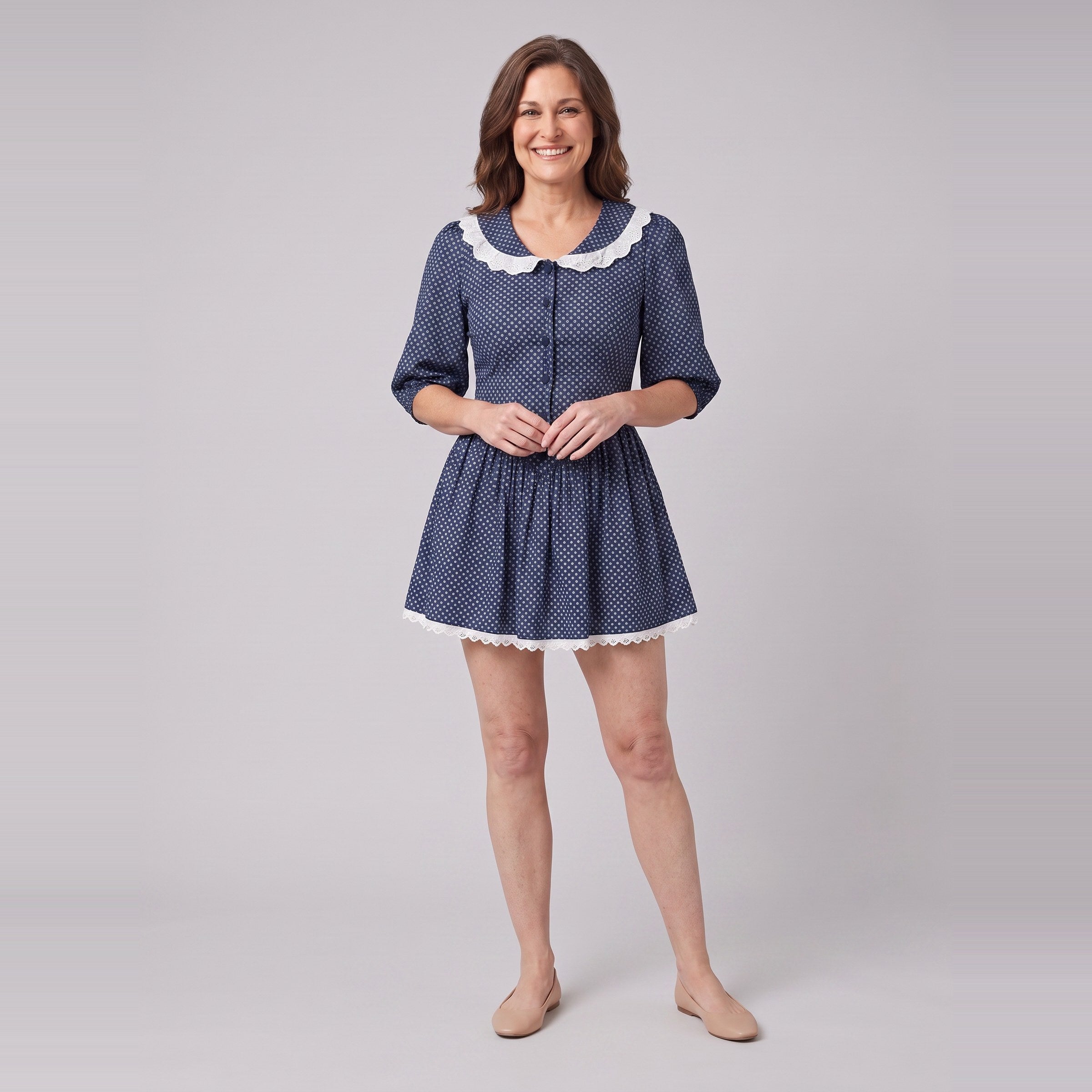 Ellery navy mini dress with a white lace collar, puff sleeves and dropped waist, front view